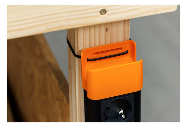 BACHMANN CONNECTUS schwarz-orange an der Werkbank mit Kabelbinder befestigt